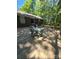 Spacious wooden deck with dining set, seamlessly blending indoor/outdoor living at 10624 Wood Meadow Dr, Charlotte, NC 28227
