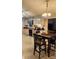 Eat-in kitchen featuring bright colored countertops and an adjacent dining area at 10624 Wood Meadow Dr, Charlotte, NC 28227