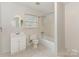 Bathroom with a shower-tub combo and a single sink at 1100 Clawson Ct, Charlotte, NC 28209