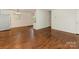 Hardwood floors and a fluid layout define this open concept living space at 1100 Clawson Ct, Charlotte, NC 28209