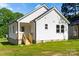 This home shows an exterior featuring well-maintained siding, windows, foundation, and a welcoming backyard at 1103 Kenly St, Salisbury, NC 28144