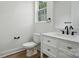 Stylish bathroom features modern fixtures and wood flooring at 1118 Allman Ext, Mount Pleasant, NC 28124