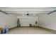 Interior of the garage featuring white walls and a water heater at 1118 Allman Ext, Mount Pleasant, NC 28124