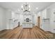 Modern kitchen with white cabinets, stainless steel appliances, a large island, and pendant lighting at 1118 Allman Ext, Mount Pleasant, NC 28124