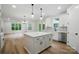 Open concept kitchen featuring an island, bright natural light, and stainless appliances at 1118 Allman Ext, Mount Pleasant, NC 28124