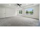 Bright main bedroom offers large windows with views and an open floor plan at 1118 Allman Ext, Mount Pleasant, NC 28124