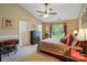 Spacious bedroom featuring a ceiling fan, ample natural light, and neutral color scheme at 118 Winborne Dr, Mooresville, NC 28115