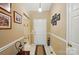 Inviting entryway with neutral walls, tiled flooring, and decorative wall art at 118 Winborne Dr, Mooresville, NC 28115