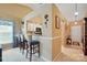 Kitchen view from living room featuring breakfast bar and entry hallway at 118 Winborne Dr, Mooresville, NC 28115