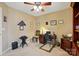 Bright office space featuring a wooden desk, chair, and bookshelf with neutral walls at 118 Winborne Dr, Mooresville, NC 28115