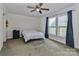 Comfortable bedroom with carpet, large windows, closet space, with natural light at 119 Marietta Rd, Mooresville, NC 28117