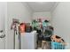 Laundry room featuring washer, dryer, shelving, and a white mini freezer at 119 Marietta Rd, Mooresville, NC 28117