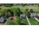 Beautiful aerial view of house with long driveway and meticulously maintained lawn at 136 Wood Duck Loop, Mooresville, NC 28117