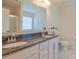 Bathroom showcasing a dual sink vanity with a granite countertop and marble flooring at 136 Wood Duck Loop, Mooresville, NC 28117