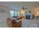 Inviting living room featuring a fireplace and comfortable seating at 136 Wood Duck Loop, Mooresville, NC 28117