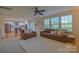 Bright living room with hardwood floors that flows into the open kitchen space at 136 Wood Duck Loop, Mooresville, NC 28117