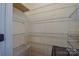 Spacious pantry with metal shelving for organized storage at 136 Wood Duck Loop, Mooresville, NC 28117