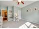 Bedroom with carpet, neutral paint, decorated walls, and a ceiling fan at 14113 Highland Meadow Rd, Charlotte, NC 28273