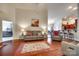 Spacious living room with hardwood floors, comfortable seating, and open access to the kitchen and dining area at 14113 Highland Meadow Rd, Charlotte, NC 28273