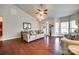 Bright and airy living room with hardwood floors, comfortable seating, and abundant natural light at 14113 Highland Meadow Rd, Charlotte, NC 28273