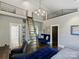 Stylish bedroom featuring a custom loft, modern lighting, and unique architectural details at 1413 Devon Dr, Charlotte, NC 28209