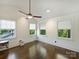 Bright and airy bedroom with three windows and hardwood flooring, showcasing natural light at 1413 Devon Dr, Charlotte, NC 28209