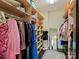 A well-organized walk-in closet offers ample storage with shelves and racks for clothing and accessories at 1413 Devon Dr, Charlotte, NC 28209