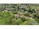 Neighborhood aerial view showcasing lush greenery, mature trees and well-maintained homes at 15324 Yarmouth Rd, Mint Hill, NC 28227