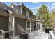 Backyard deck area featuring a grill and seating at 15324 Yarmouth Rd, Mint Hill, NC 28227