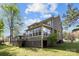 Spacious backyard with deck, lawn, and beautiful landscaping at 15324 Yarmouth Rd, Mint Hill, NC 28227