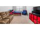 Spacious bedroom with carpet, a sofa and a television at 15324 Yarmouth Rd, Mint Hill, NC 28227