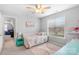 Cozy bedroom with a daybed, rainbow decor, and carpet, great for a  at 15324 Yarmouth Rd, Mint Hill, NC 28227