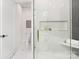 Modern bathroom with glass enclosed shower, toilet, and floating shelf cubby for added storage at 1534 Easy St, Belmont, NC 28012