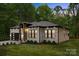 Attractive brick home with a modern garage, manicured lawn, and stylish front facade at 1534 Easy St, Belmont, NC 28012