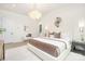 Bright and spacious main bedroom with stylish lighting, ensuite bath and seating area at 1534 Easy St, Belmont, NC 28012