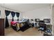 Bright bedroom with a bed, desk, and modern decor at 1832 J Julian Ln, Charlotte, NC 28208