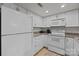 Bright kitchen with white appliances, ample countertop space, and abundant cabinet storage at 1832 J Julian Ln, Charlotte, NC 28208