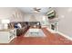 Comfortable living room with hardwood floors, fireplace, and a large leather sectional sofa at 1916 Pine Mountain Rd, Charlotte, NC 28214