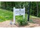 Sign for the 'Northwoods Nature Trail' indicating a nearby outdoor recreation area at 1916 Pine Mountain Rd, Charlotte, NC 28214