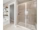 Bathroom with a glass shower, separate tub, and modern fixtures at 2041 Topaz Plz, Davidson, NC 28036