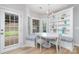 Charming breakfast nook with built-in bench seating, shelving, and natural light, ideal for casual dining at 2041 Topaz Plz, Davidson, NC 28036
