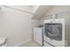 The laundry room offers modern appliances and ample space for washing and drying clothes at 2041 Topaz Plz, Davidson, NC 28036