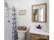 Bathroom with a modern sink and a shower featuring a black and white curtain at 2054 Hickory Hills Dr, Denver, NC 28037