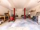 Spacious garage with ample room for storage, equipment, and a lawn mower, offering versatile utility at 2054 Hickory Hills Dr, Denver, NC 28037