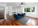 Inviting living room with hardwood floors, a large window, and neutral decor at 2054 Hickory Hills Dr, Denver, NC 28037