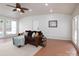 Finished room with windows, recessed lighting, ceiling fan and a comfortable brown sofa at 2054 Hickory Hills Dr, Denver, NC 28037