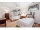 Charming bedroom featuring two twin beds with floral-patterned bedding and decorative window treatments at 2126 Norton Rd, Charlotte, NC 28207