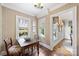 Cozy dining area with natural light, classic wallpaper, and view to the exterior at 2126 Norton Rd, Charlotte, NC 28207