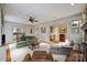 Spacious living room featuring comfortable seating and access to the kitchen and office at 2126 Norton Rd, Charlotte, NC 28207