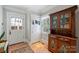 Traditional mud room featuring tile floors, ample storage, natural light, and access to exterior at 2126 Norton Rd, Charlotte, NC 28207